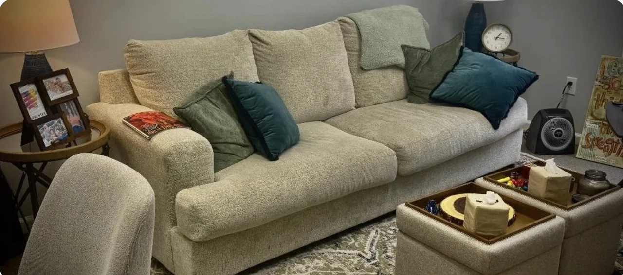 Therapy room with a sofa and armchairs at Turned Leaf Psychiatry in Ridgeland, MS